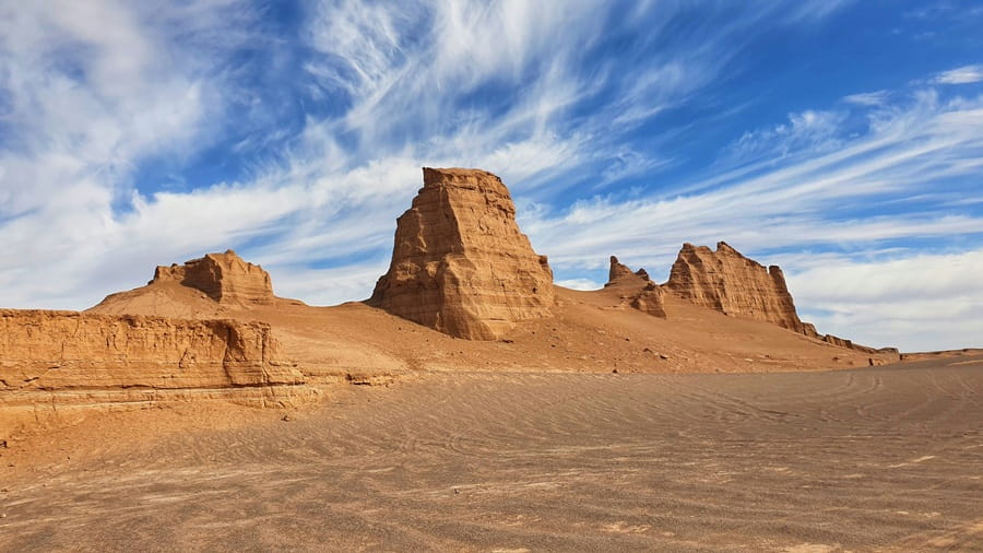 Sunset over Kaluts rock formations in Lut Desert Iran